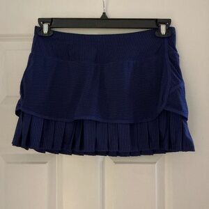 Athleta brand Skort, size small, color blue with darker blue pinstripes.
